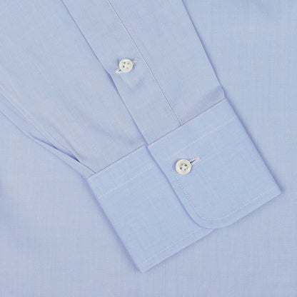 Close-up of an Alessandro Gherardi Sky Blue Cotton Twill Single Cuff Shirt sleeve, showcasing two white buttons on the pure cotton cuff.
