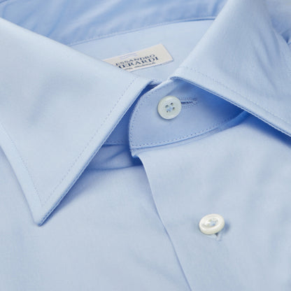 A high-quality Alessandro Gherardi men's shirt in a Tuscan countryside setting, featuring a close up of the Sky Blue Fine Cotton Single Cuff Shirt.