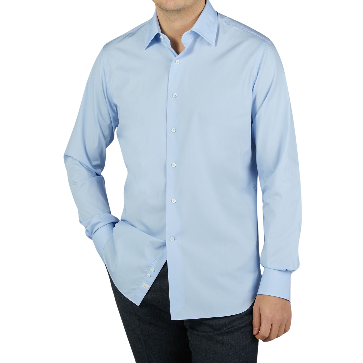 A man wearing an Alessandro Gherardi Sky Blue Fine Cotton Single Cuff Shirt.