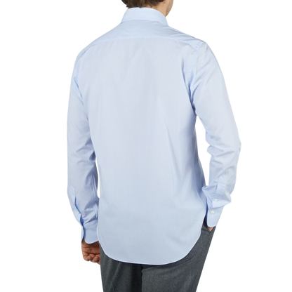 The high-quality back view of a man wearing a Sky Blue Grid Check Cotton Single Cuff Shirt by Alessandro Gherardi.