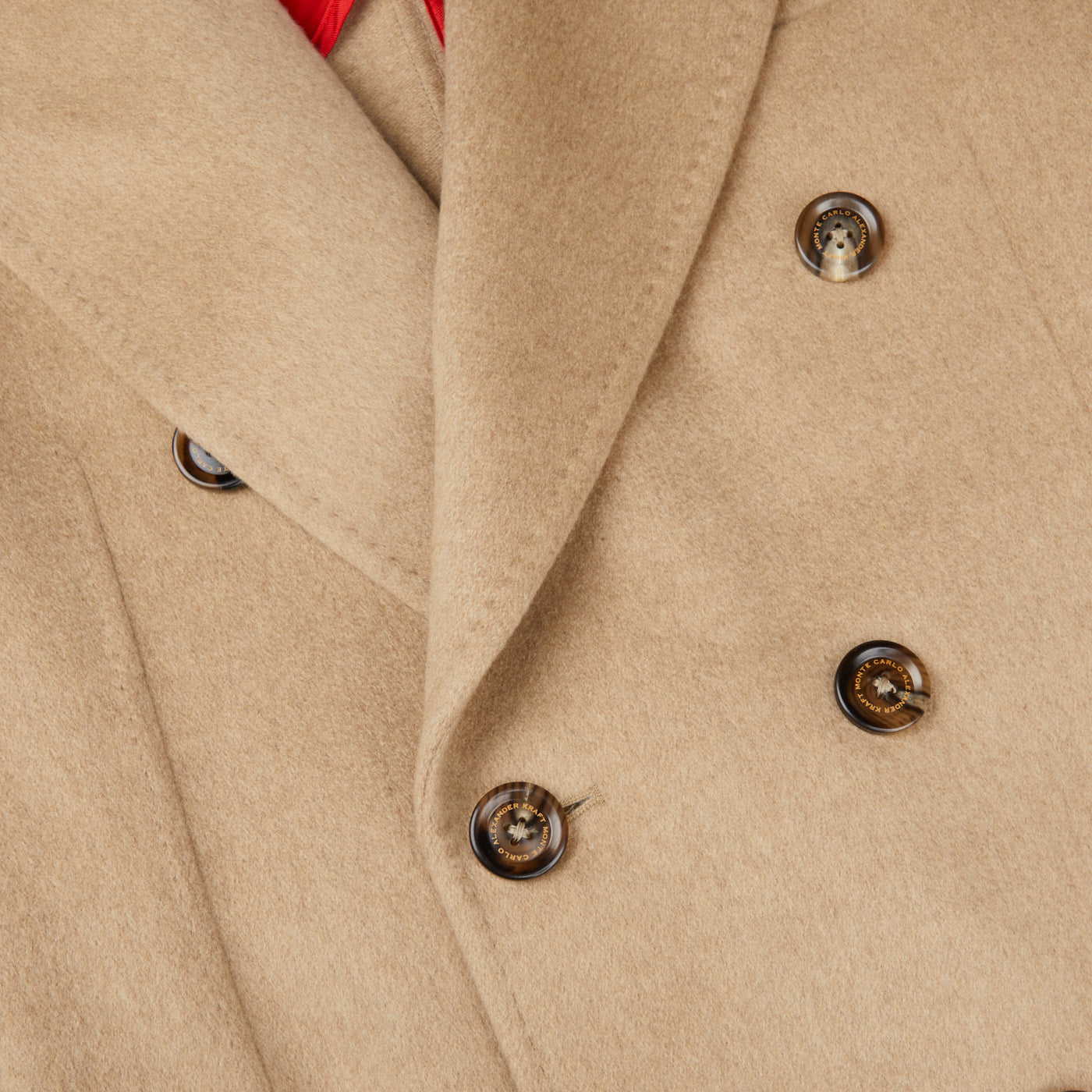A close up image of the Alexander Kraft Monte Carlo Camel Beige Pure Cashmere Florence DB Overcoat.