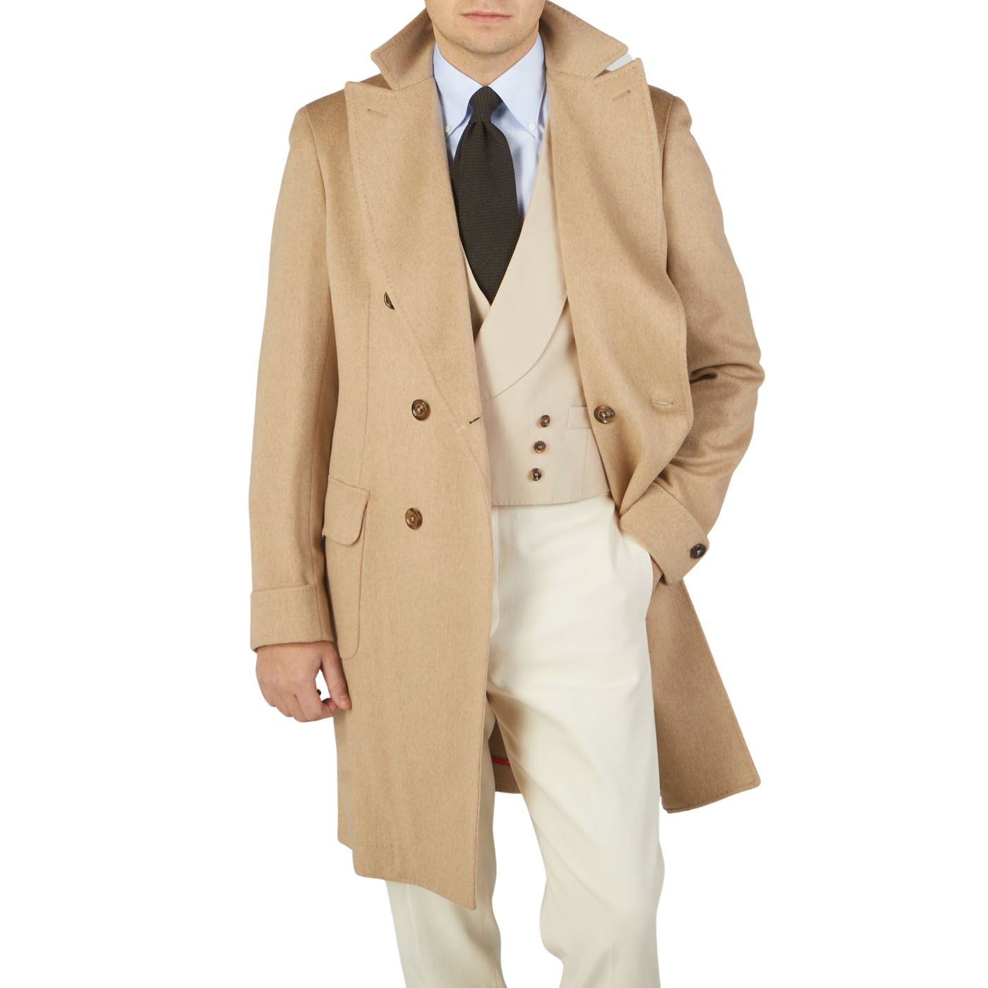 A man in an Alexander Kraft Monte Carlo Camel Beige Pure Cashmere Florence DB Overcoat is posing for a photo.