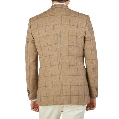 The back view of a man wearing the stylish Alexander Kraft Monte Carlo Caramel Estate Wool Tweed Provence Jacket.