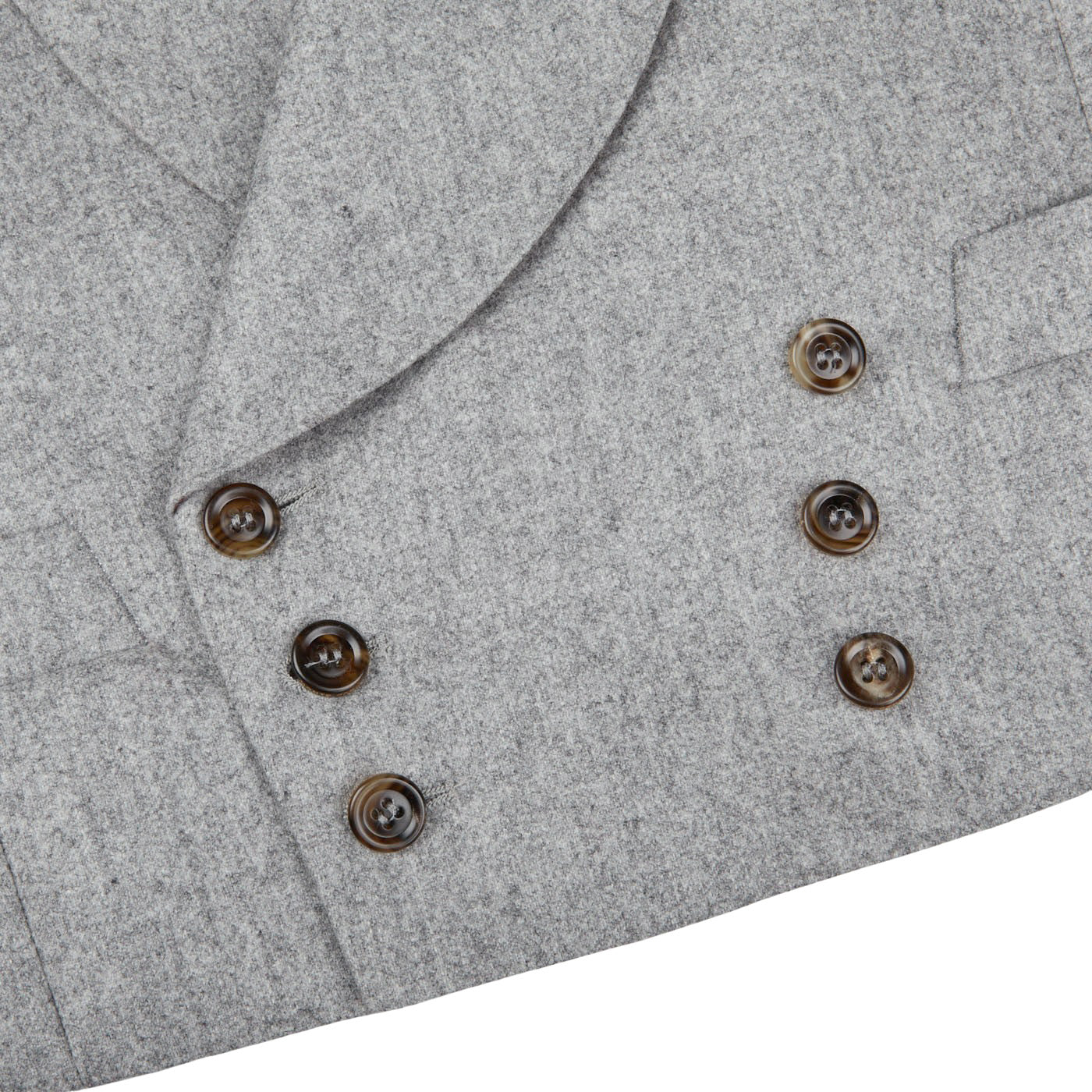 A close up of a Light Grey VBC Wool Flannel DB Waistcoat with buttons, made by Alexander Kraft Monte Carlo.