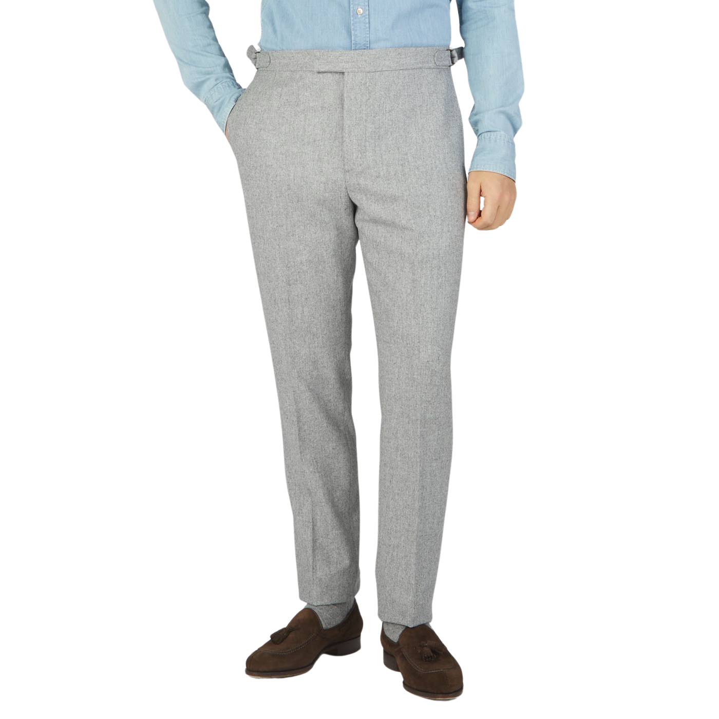 A man wearing Light Grey VBC Wool Flannel Riviera Trousers made by Alexander Kraft Monte Carlo and a blue shirt.