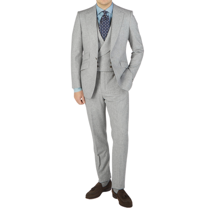 A man in a Light Grey VBC Wool Flannel Signature Jacket by Alexander Kraft Monte Carlo, posing for a photo.