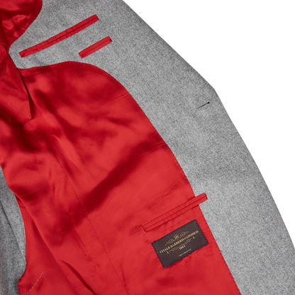 The back of a Light Grey VBC Wool Flannel Signature Jacket made in Italy, crafted from pure wool flannel, Alexander Kraft Monte Carlo.