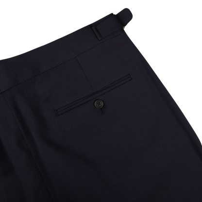 A close up of formal Navy Blue Textured Worsted Wool Riviera Trousers made by Alexander Kraft Monte Carlo.