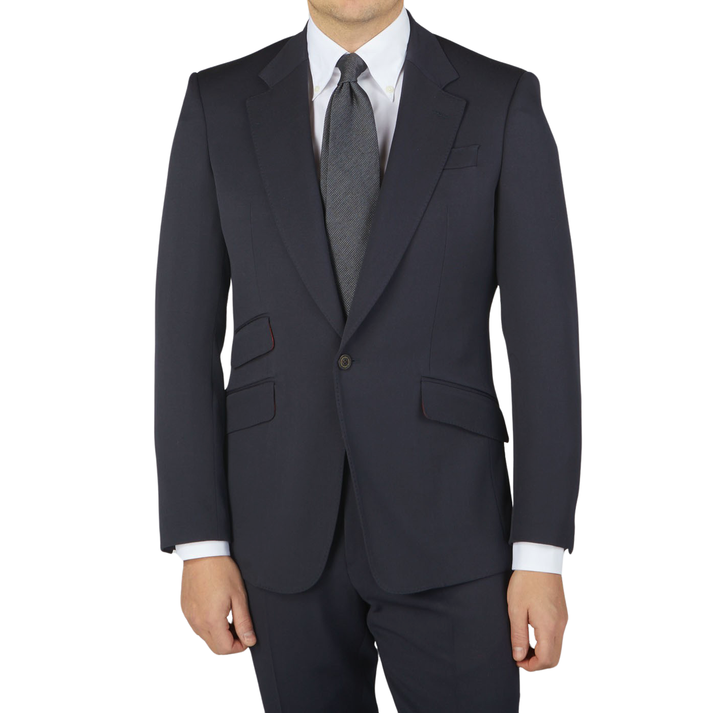 A man is posing in a Navy Blue Textured Worsted Wool Signature Jacket by Alexander Kraft Monte Carlo, wearing a suit and tie.