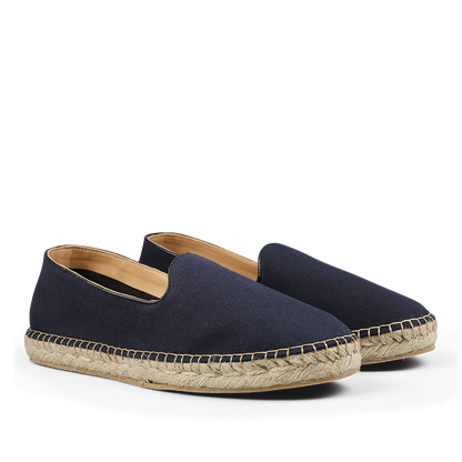 A pair of dark blue cotton luxury espadrilles by Alexander Kraft Monte Carlo, featuring a woven jute sole.