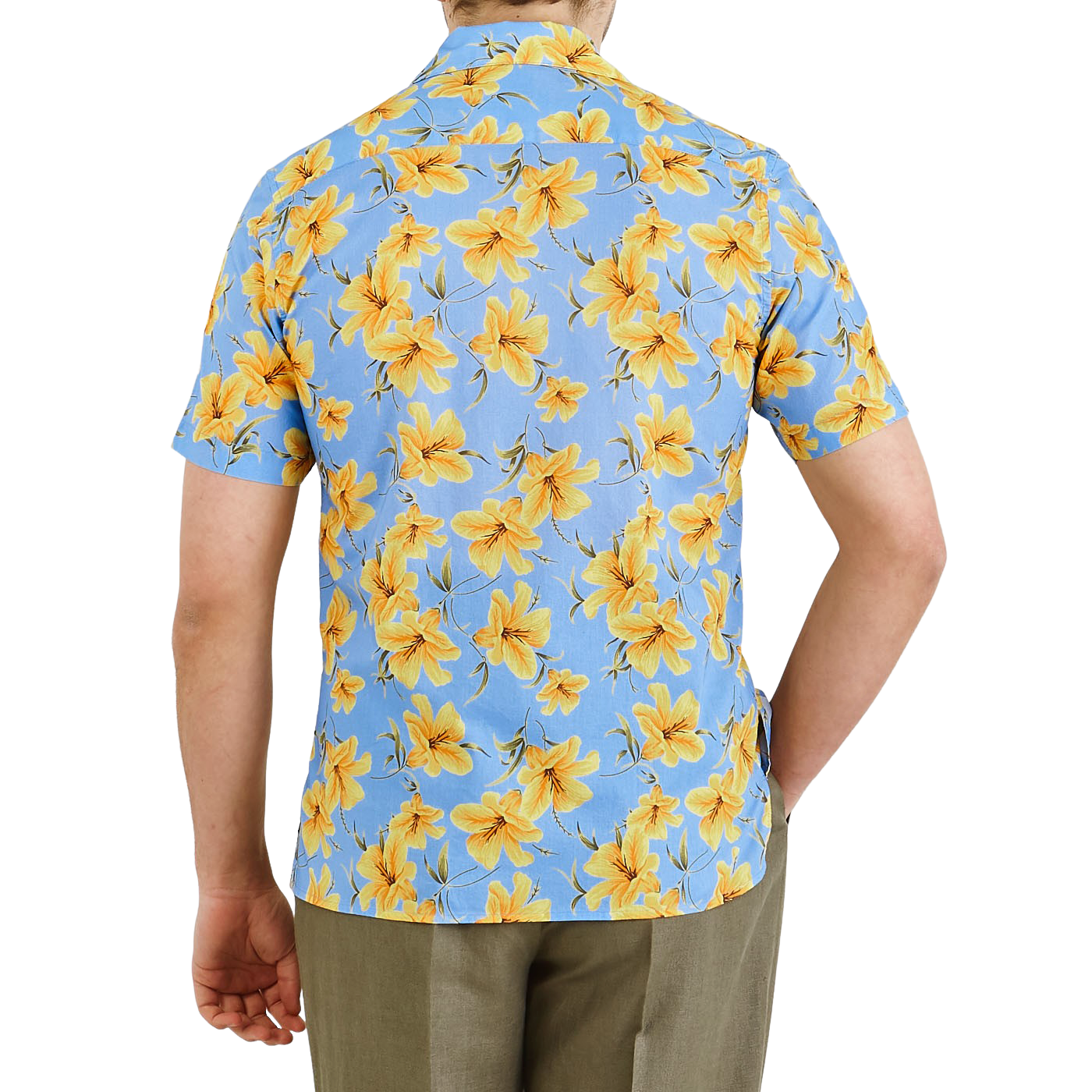 A person wearing an Altea Light Blue Printed Cotton Short Sleeve Shirt with a yellow flower print and khaki pants is shown from the back.