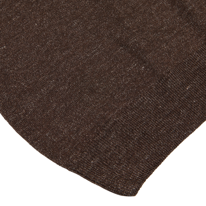 Close-up of a brown, Melange Linen Cashmere Blend Polo Shirt fabric swatch with a textured weave on a white background by Altea.