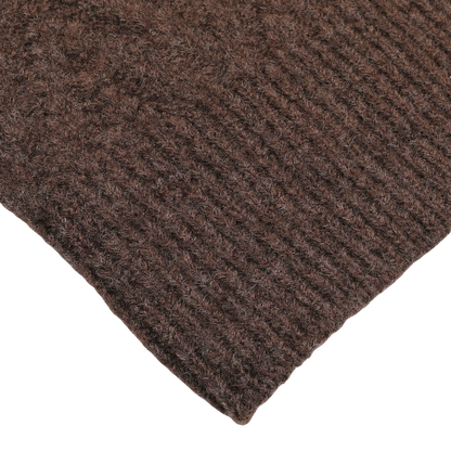 Close-up of the corner of the Brown Wool Chevron Knit V-Neck by Altea lying flat against a white surface.