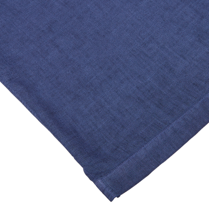 A close-up view of a textured Altea Dark Blue Linen Blend Open Collar Shirt fabric on a white background, highlighting its summer essential short sleeve design.