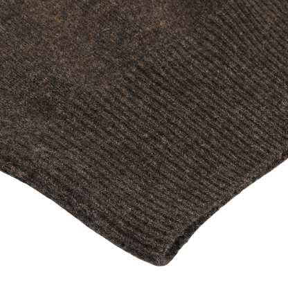 Close-up of the corner of Altea's Dark Brown Shetland Wool Button Cardigan, highlighting its distinct ribbing and rich texture.