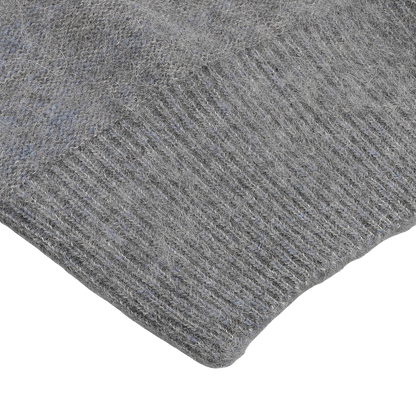 Close-up of the Grey Melange Norwegian Wool Alpaca Crewneck by Altea, showcasing its gray knitted fabric with a fuzzy texture and visible ribbed pattern, characteristic of Norwegian design in a cozy crewneck sweater made from a luxurious wool-alpaca blend.