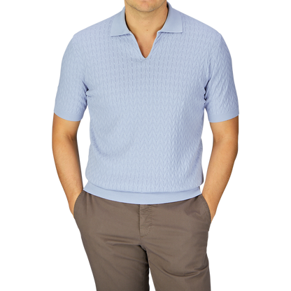 Man wearing a Altea light blue patterned, pure cotton Capri collar polo shirt and brown trousers.