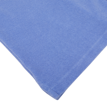 A light blue Altea microfiber cleaning cloth on a white surface.