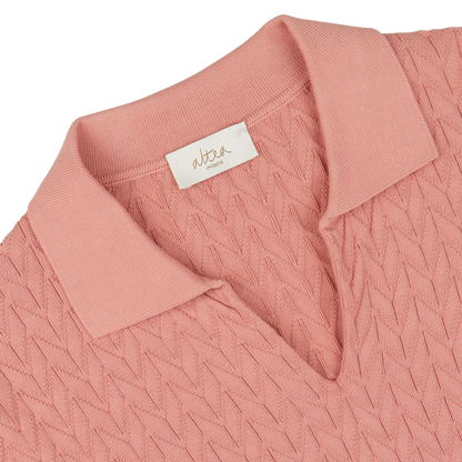 Close-up of a Muted Pink Cotton Capri Collar Polo Shirt with chevronne knit pattern and Altea label on the collar.