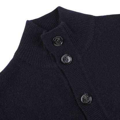 Close-up of the Altea Navy Blue Shetland Wool Button Cardigan, featuring a ribbed collar and three black buttons.