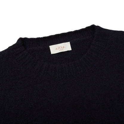 A seasonal Altea Navy Blue Wool Alpaca Crewneck Sweater with a label on it.