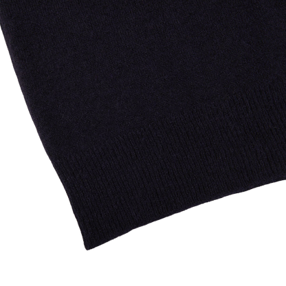 A seasonal close up of an Altea navy blue wool alpaca crewneck sweater.