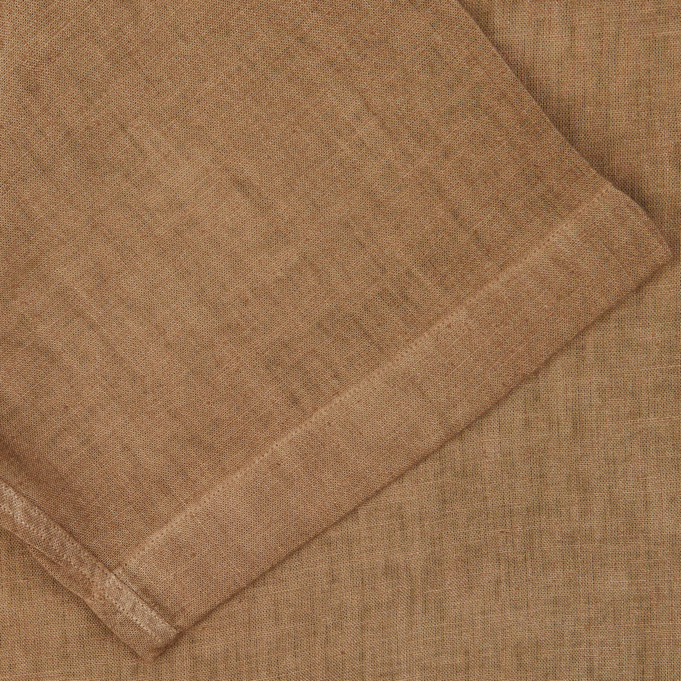 Close-up view of a folded Altea Tobacco Brown Linen Blend Camp Collar Shirt with a visible textured weave.