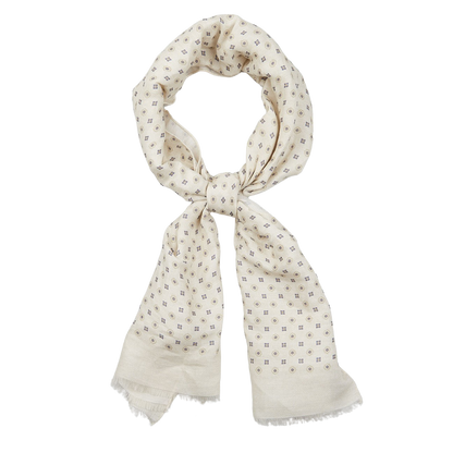 Cream Medallion Printed Linen Cotton Scarf by Amanda Christensen, tied in a knot, displayed against a white background.