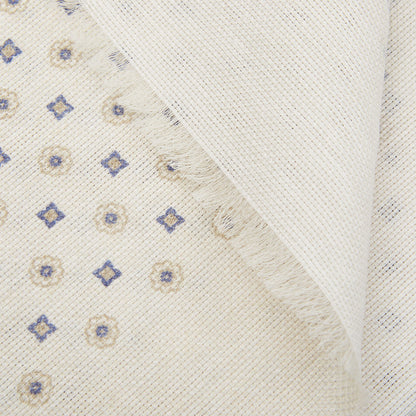 Close-up of a textured Cream Medallion Printed Linen Cotton Scarf with a fringe edge by Amanda Christensen.