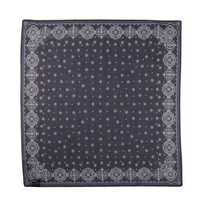 A Navy Blue Medallion Printed Cotton Bandana with a white paisley pattern and a border design by Amanda Christensen.