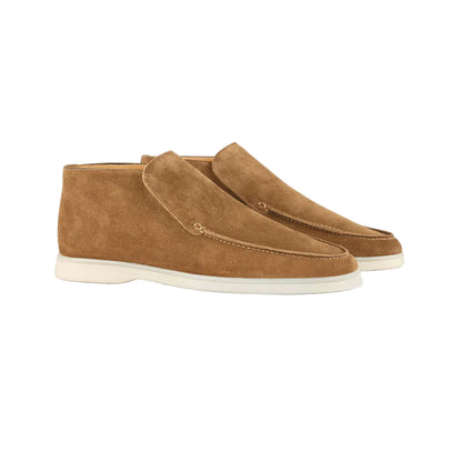 A pair of Aurélien Beige Softey Suede City Loafers with white rubber soles, minimalist design, and visible stitching are positioned side by side on a plain white background. , available at Richard Gelding Mayfair