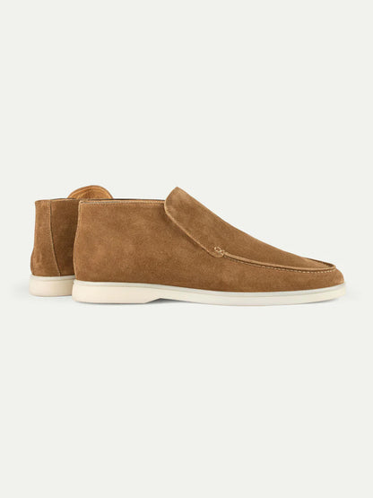 Aurélien Beige Softey Suede City Loafer with a minimalist moc-toe design and white rubber outsole, shown on an off-white background. One shoe faces right, the other is angled from heel to side to highlight Smart Luxury. , available at Richard Gelding Mayfair
