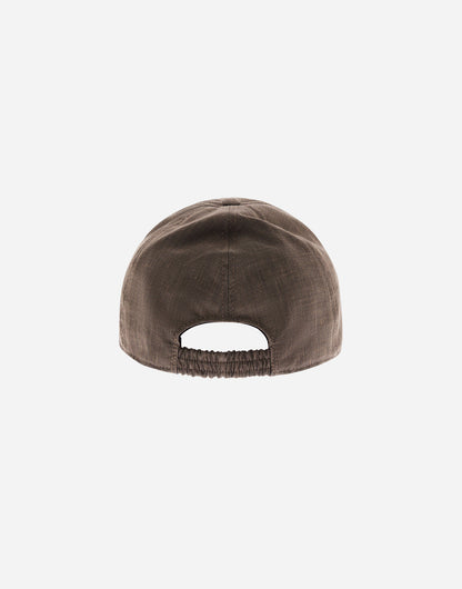 A beige Herno Linen Wool Woven Cap is displayed from the back, showing its elastic band and visible stitching. The simple, casual design stands out against a solid white background. , available at Richard Gelding Mayfair