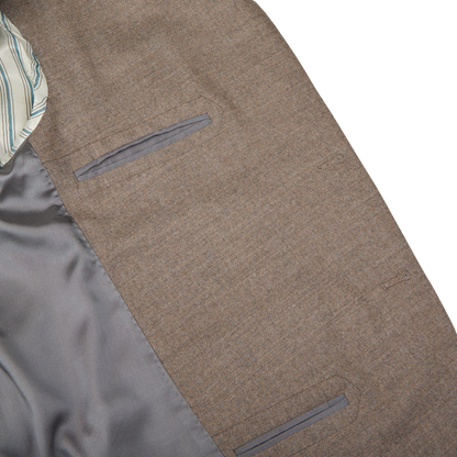 A close up of a Boglioli Beige Grey Wool Flannel K Suit with an understated elegance.