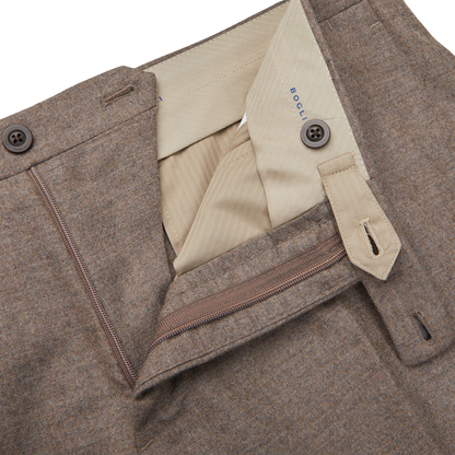 A close up of an understated Beige Grey Wool Flannel K Suit trouser with a pocket by Boglioli.