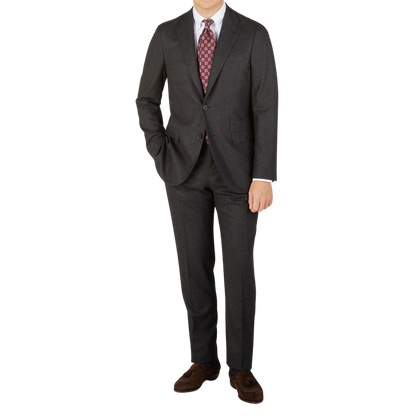 A man is posing for a picture in a Boglioli Charcoal Grey Wool Flannel K Suit.