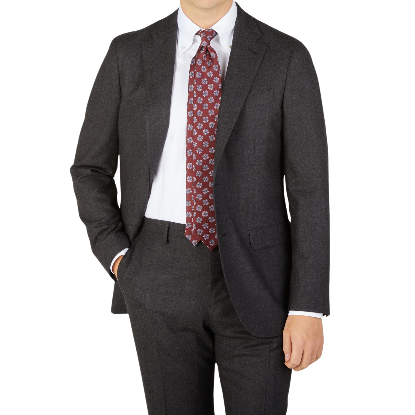 A man is posing in a Boglioli Charcoal Grey Wool Flannel K Suit and tie.