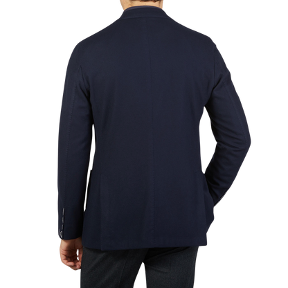 The back view of a man wearing a Boglioli Navy Blue Brushed Wool K Jacket.
