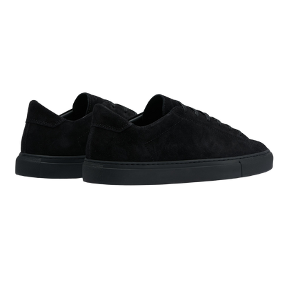 A pair of All Black Suede Racquet Sr sneakers by CQP with rubber sole on a white background.