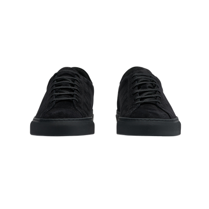A pair of handmade All Black Suede Racquet Sr sneakers by CQP on a white background.