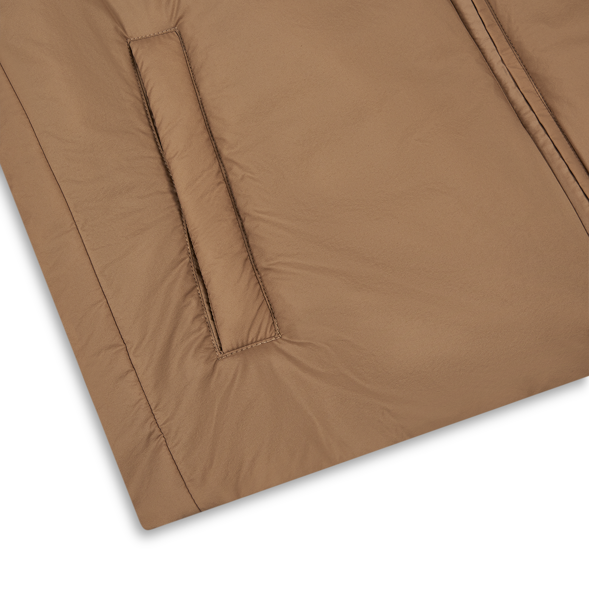 Close-up of the Herno Camel Brown Lightweight Nylon Gilet, featuring a neatly stitched, slanted side pocket and padded matte fabric that highlights its stylish color and texture against a white background. , available at Richard Gelding Mayfair
