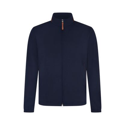 The Manto Navy Loro Piana Wool/Silk Rain System Asiago Blouson features a high collar, front zipper, long sleeves, and subtle brown accents for a minimalist look. Crafted from a luxurious wool and silk blend. , available at Richard Gelding Mayfair