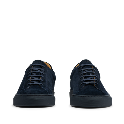 A pair of All Blue Suede Leather Racquet Sr sneakers with laces, made from suede calf leather, viewed from the front by CQP.