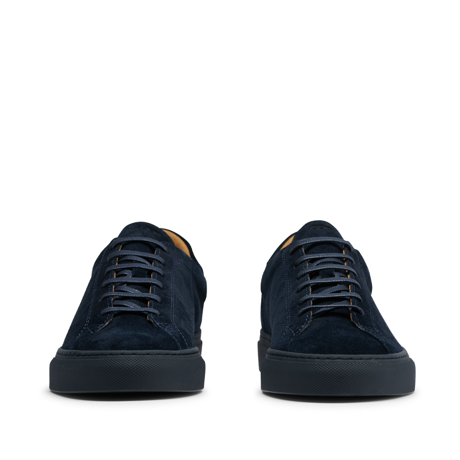 A pair of All Blue Suede Leather Racquet Sr sneakers with laces, made from suede calf leather, viewed from the front by CQP.