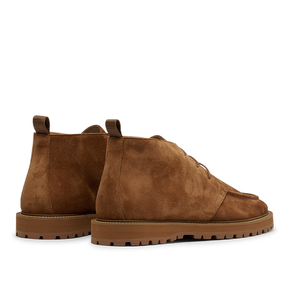 CQP's Snuff Suede Leather Astra Dessert Boots feature a brown suede upper, a lace-up design, and rubber soles, presented on a white background.