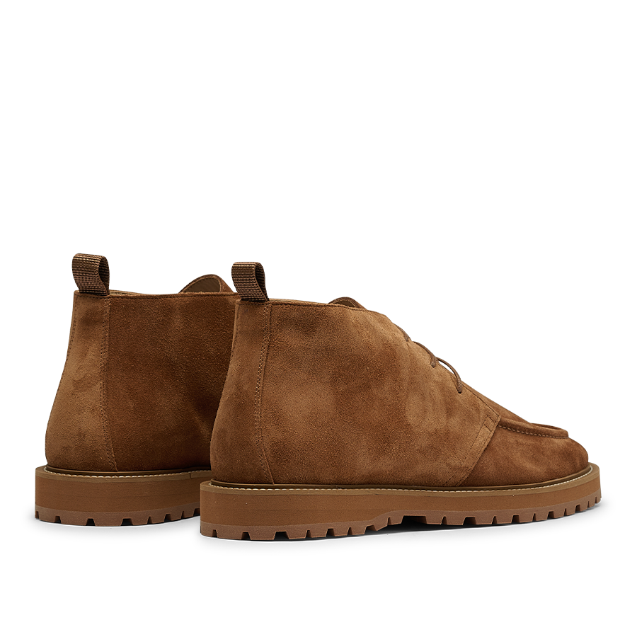 CQP's Snuff Suede Leather Astra Dessert Boots feature a brown suede upper, a lace-up design, and rubber soles, presented on a white background.