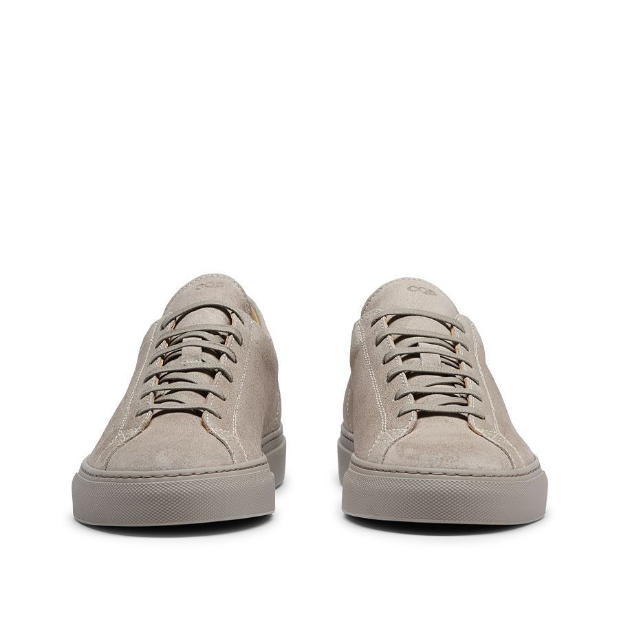 A pair of CQP Khaki Racquet Sr Sneakers in beige suede with a rubber sole.