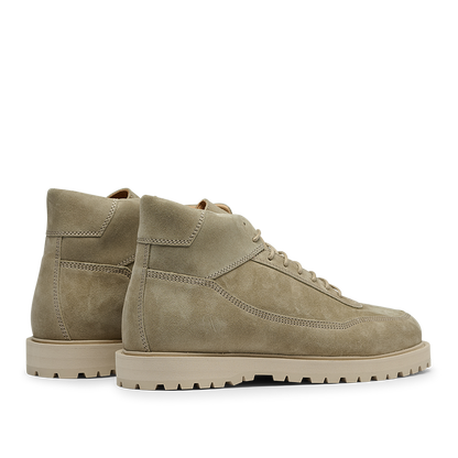 A pair of CQP Light Beige Suede Leather Sabulo Boots with rugged, water-repellant rubber soles placed side by side, facing right.