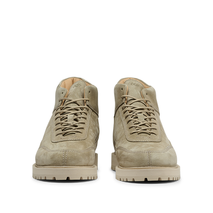 Front view of a pair of CQP Light Beige Suede Leather Sabulo Boots featuring rugged soles and a water-repellent upper.