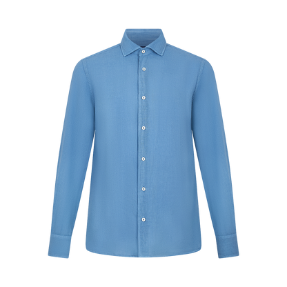 The Fedeli Blue Linen Cutaway Collar Nick ML Shirt features long sleeves, white buttons, and buttoned cuffs. Displayed on a white background, its elegant yet simple design is ideal for both formal and casual occasions. , available at Richard Gelding Mayfair
